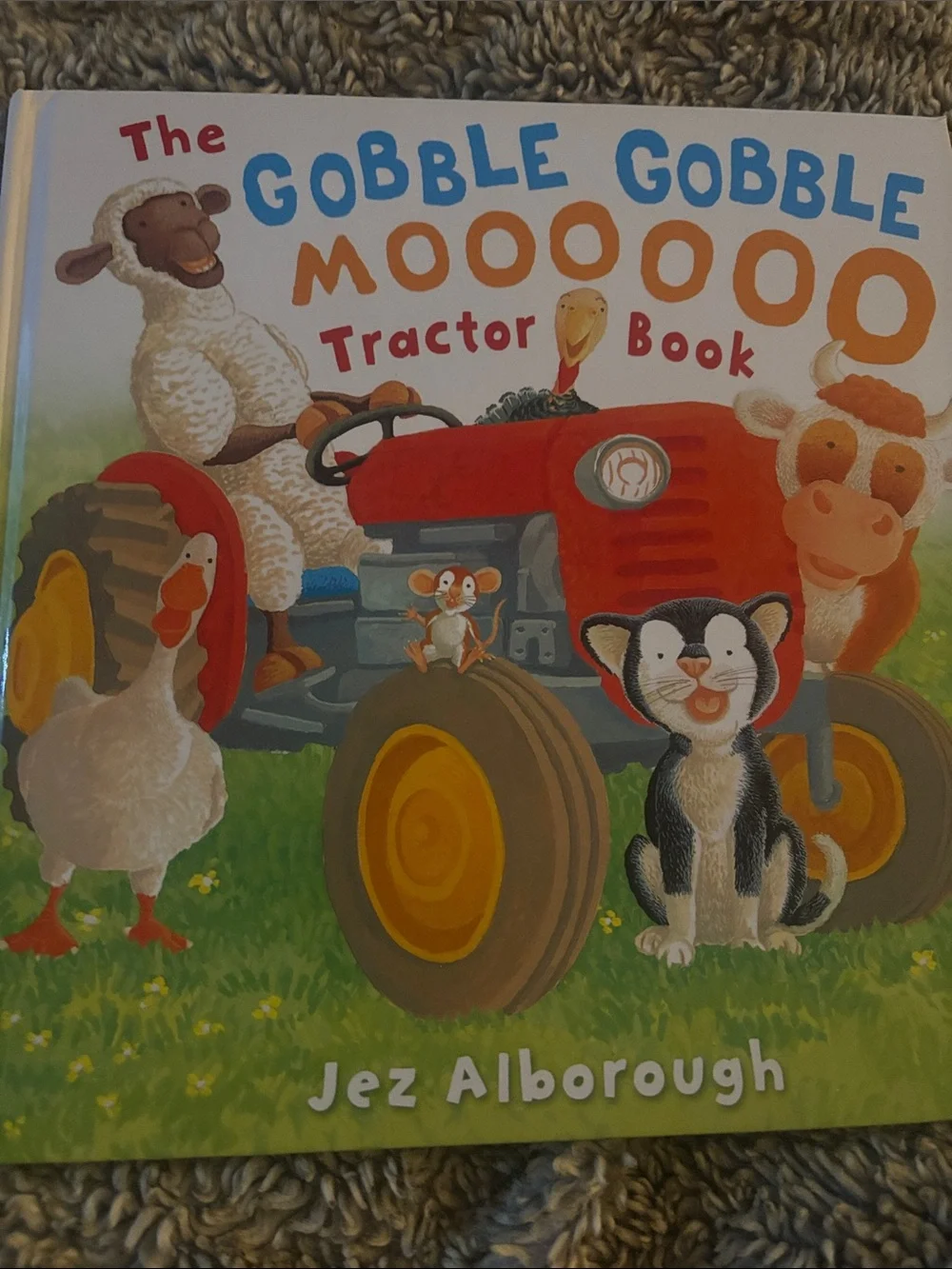 The Gobble Gobble Moooooo Tractor Book by Jez Alborough.